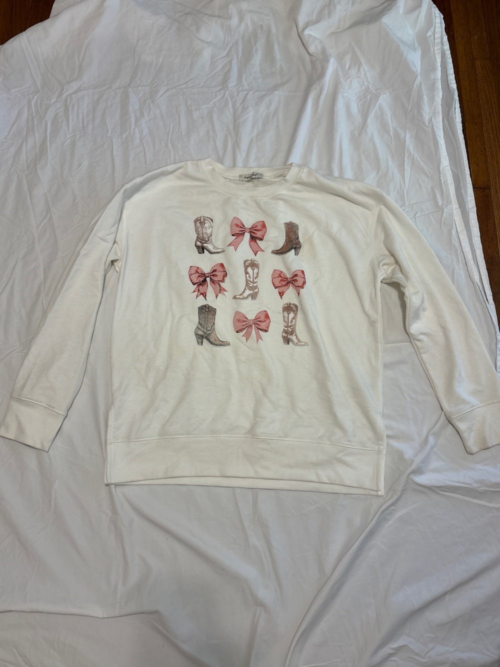 Woman’s Sweatshirt with Pink Bows and Boots Graphic